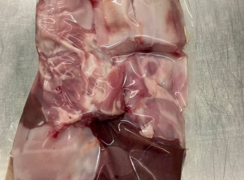 Demi lapin fermier avec tête et abats - Photo 1 sur 1